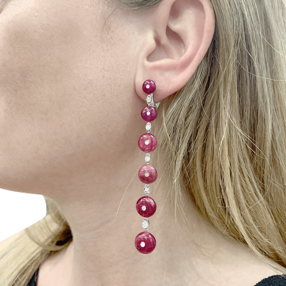 Boucles d'oreilles Repossi, or blanc, rubis et diamants.