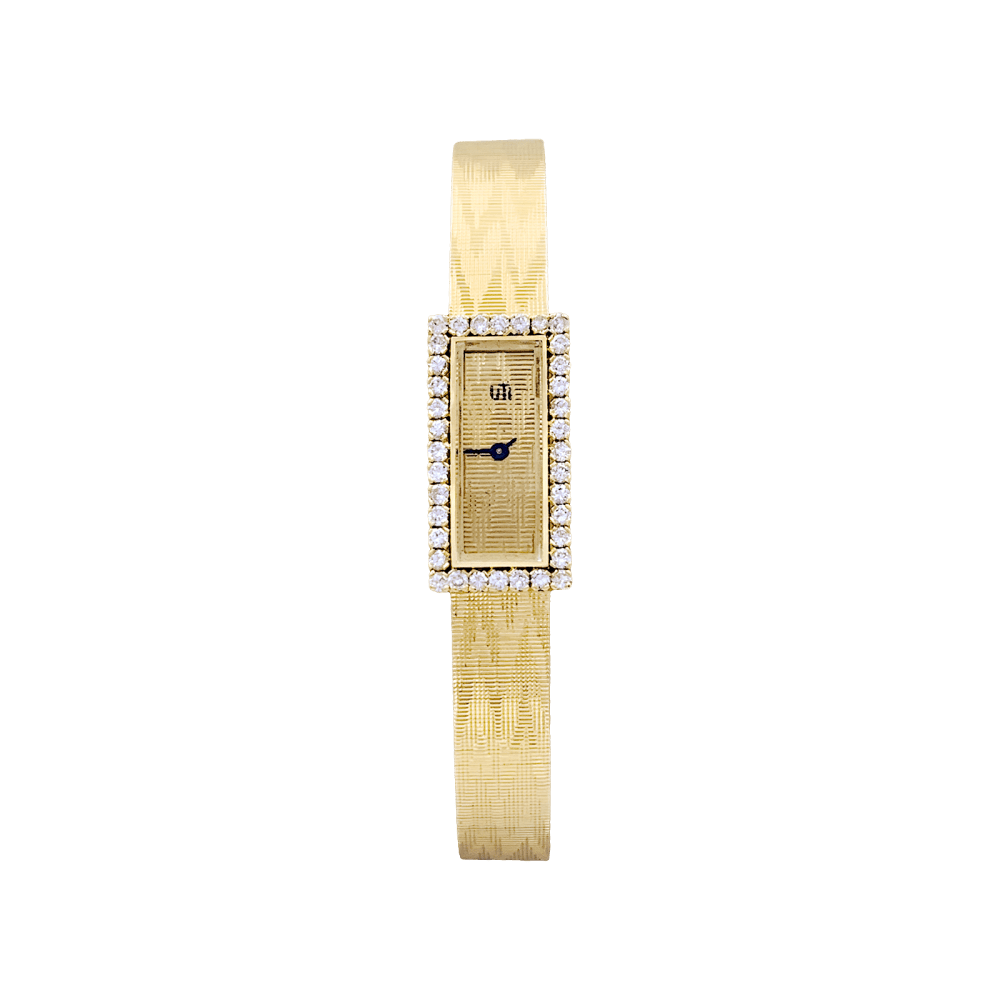 Montre vintage UTI, mouvement Blancpain, or jaune, diamants.