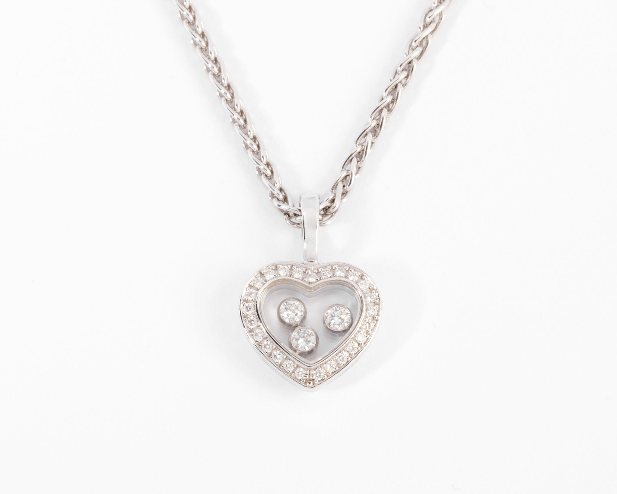Chopard, pendentif or gris signé