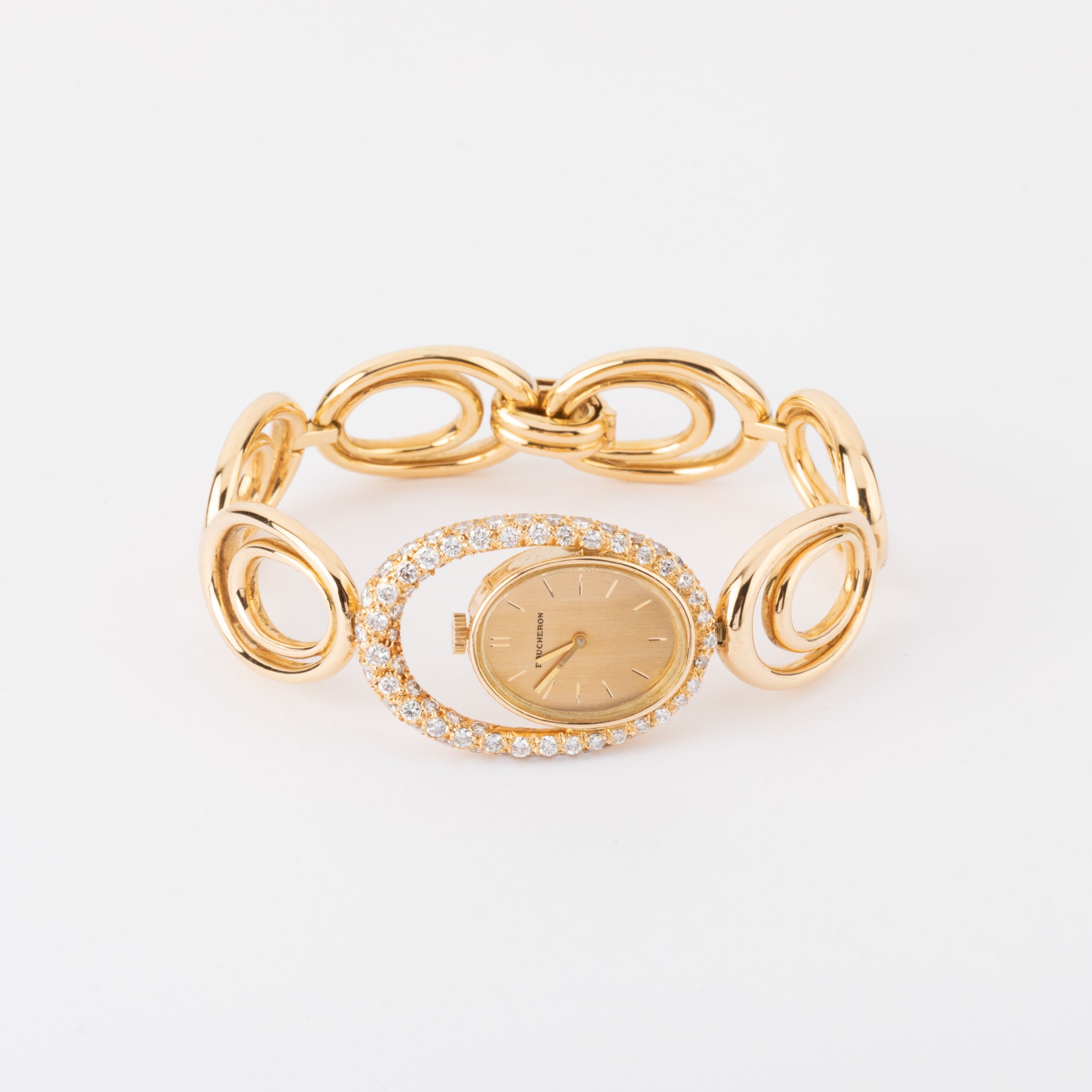 Boucheron, a gold and diamond watch on gold