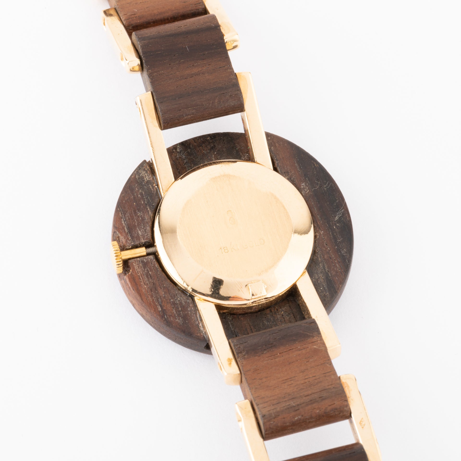 Gucci, a vintage watch in yellow gold and amourette wood