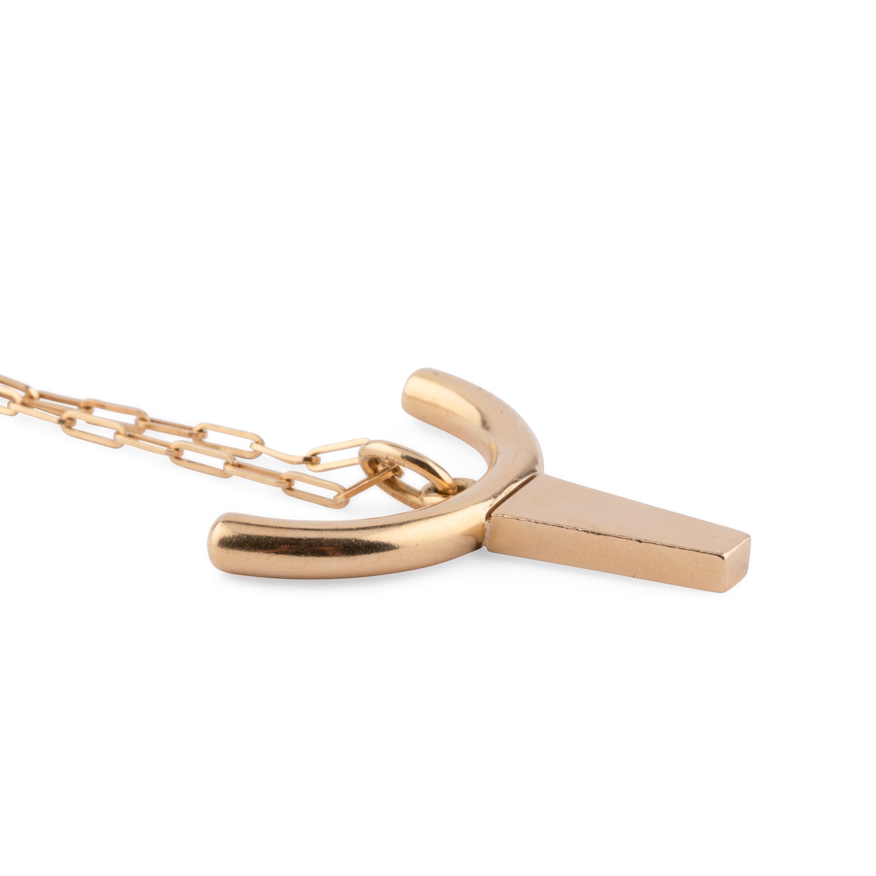 Yellow gold necklace decorated with a pendant representing a bull's head