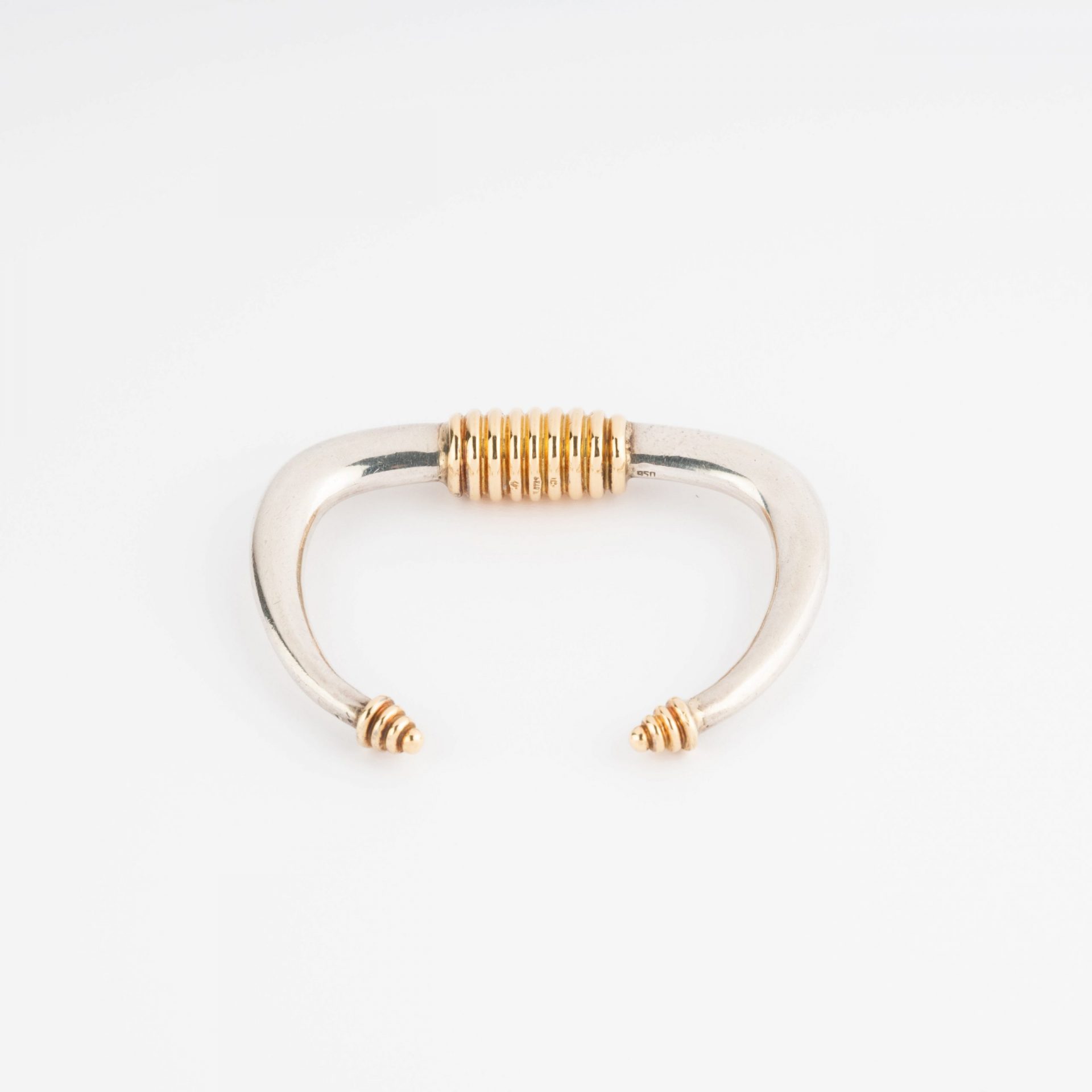 Silver and gold rigid bracelet from Zolotas