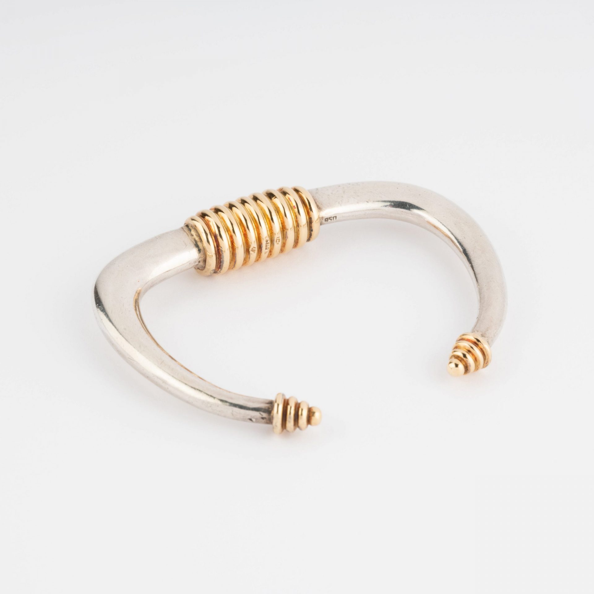 Silver and gold rigid bracelet from Zolotas