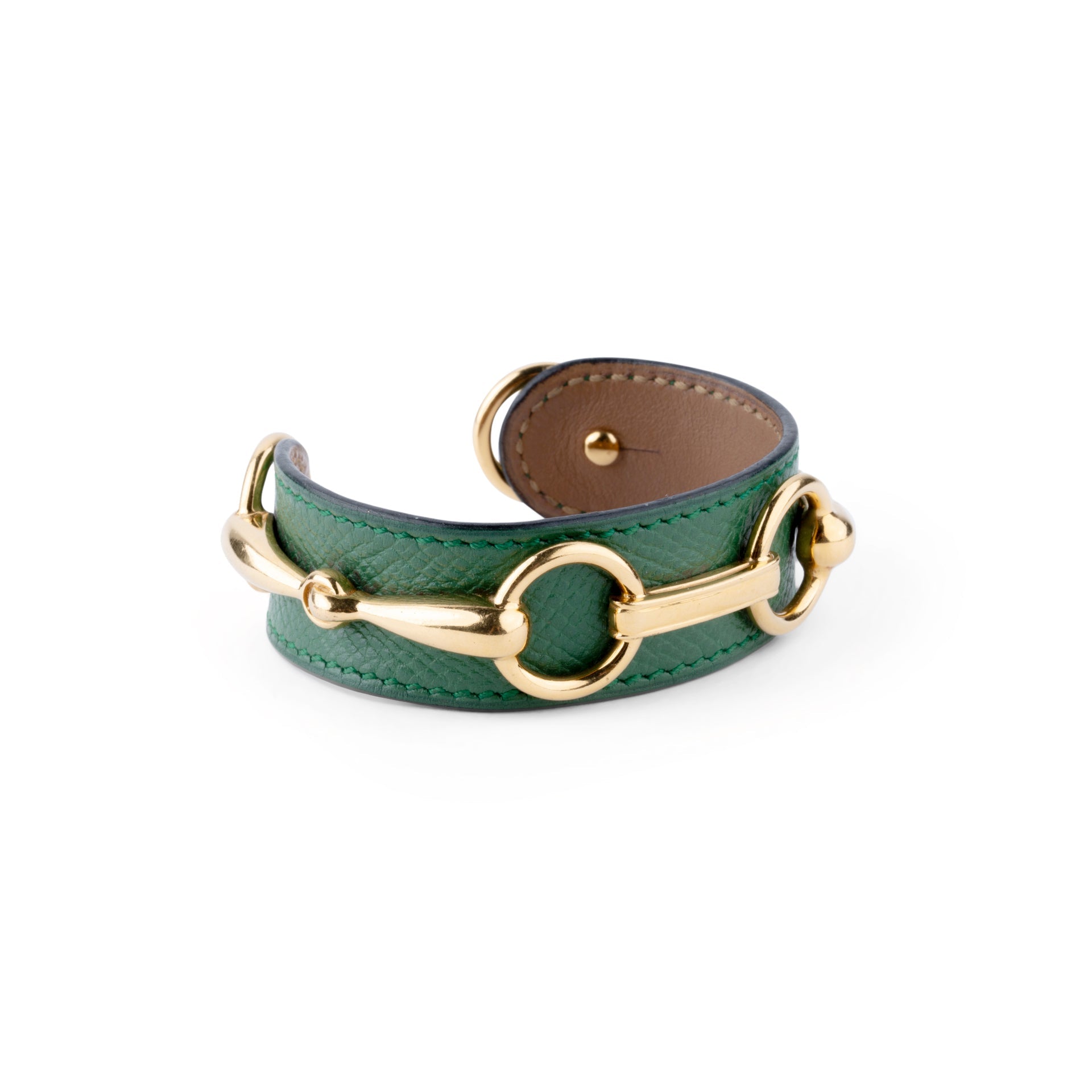 Bracelet de la maison Hermès en cuir et métal doré