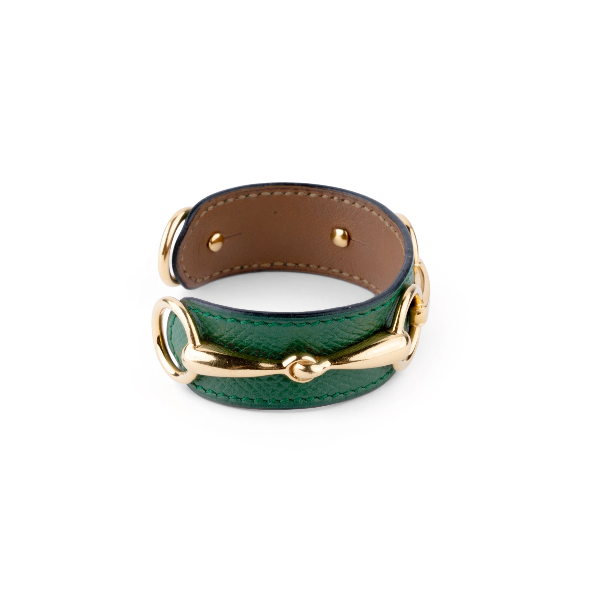 Bracelet from the house of Hermès in leather and gold metal