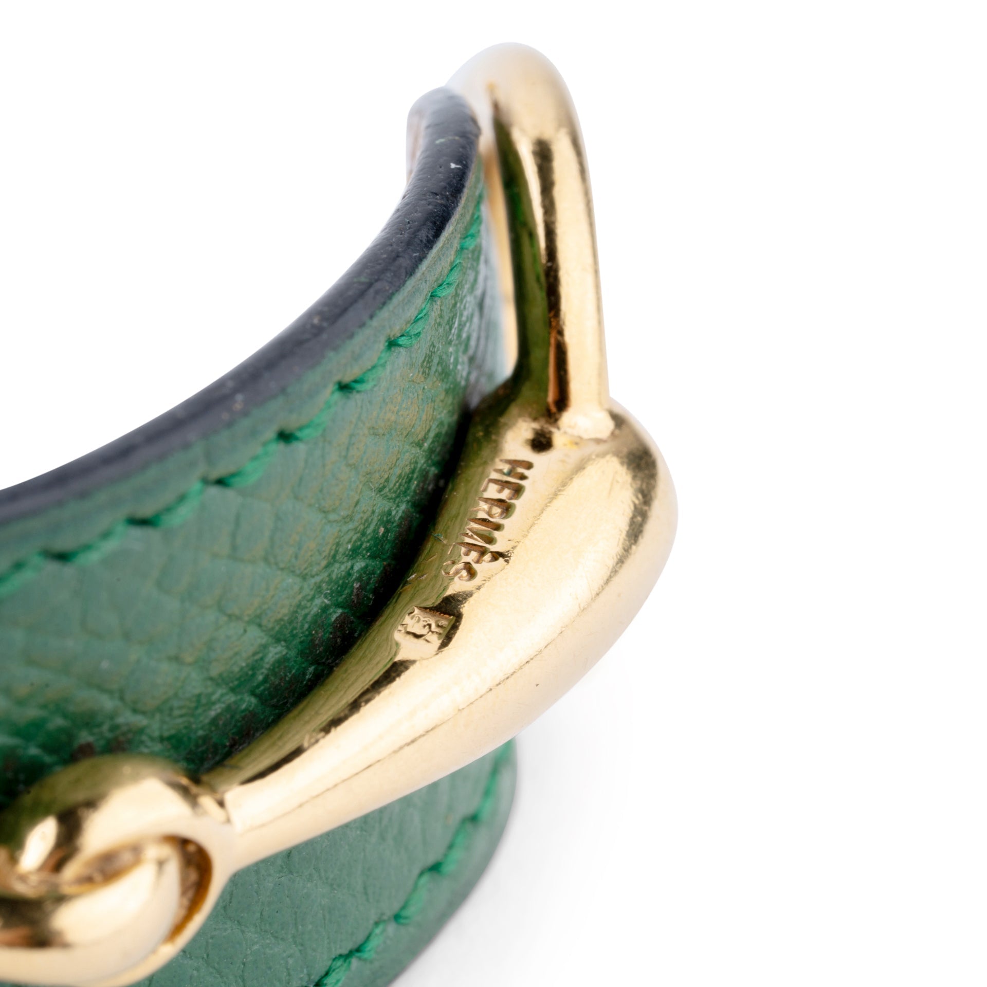 Bracelet from the house of Hermès in leather and gold metal