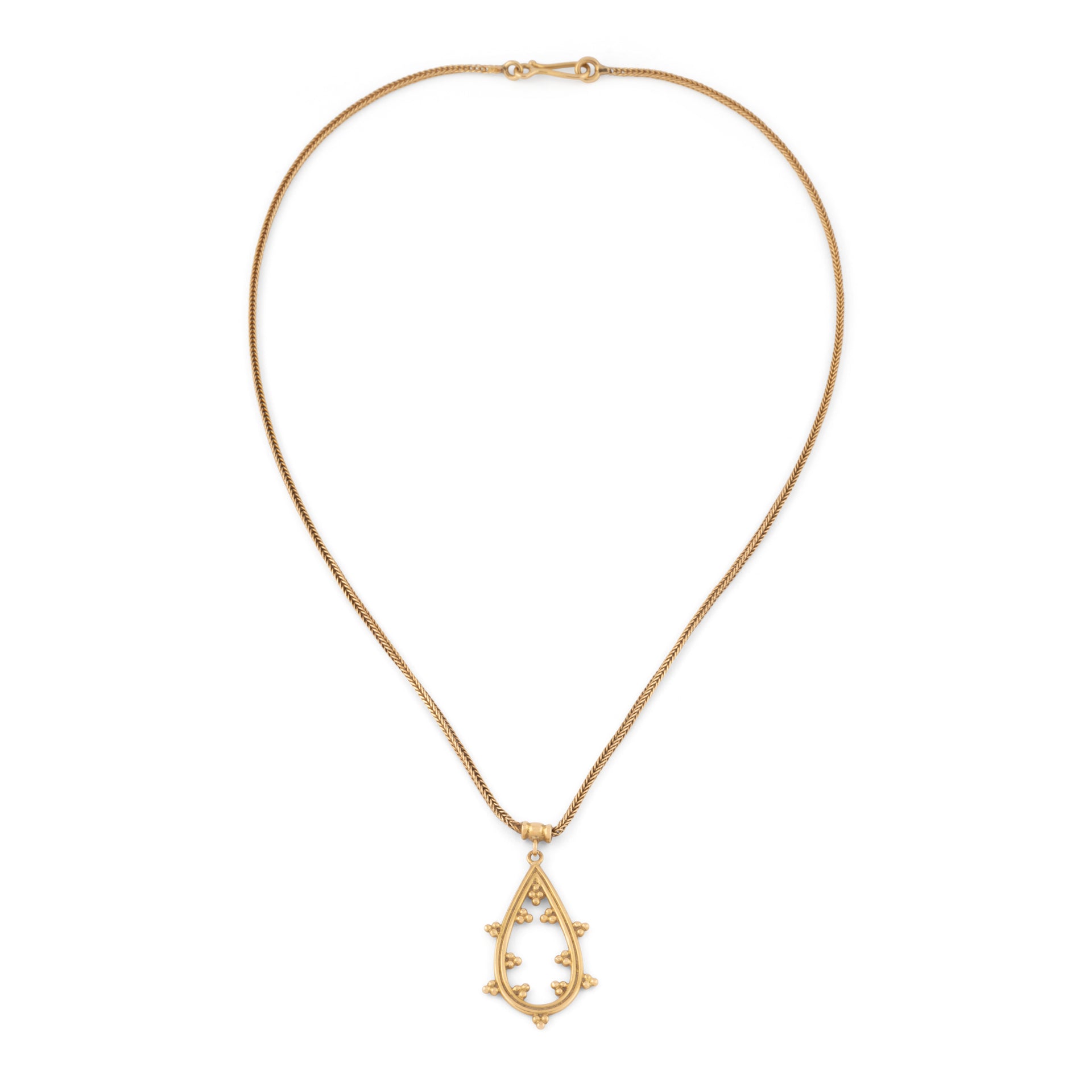 Yellow gold chain and matching chiseled pendant by Greek designer Zolotas