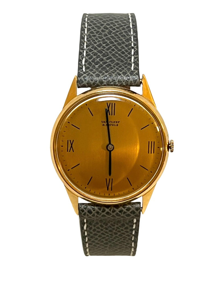 Van Cleef and Arpels, Montre en or sur cuir