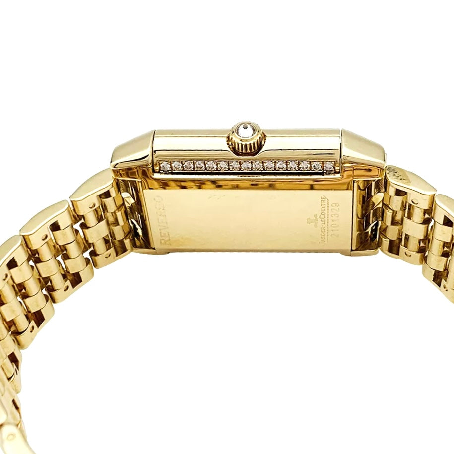 Montre Jaeger Lecoultre "Reverso Duetto" en or jaune, nacre et diamants.