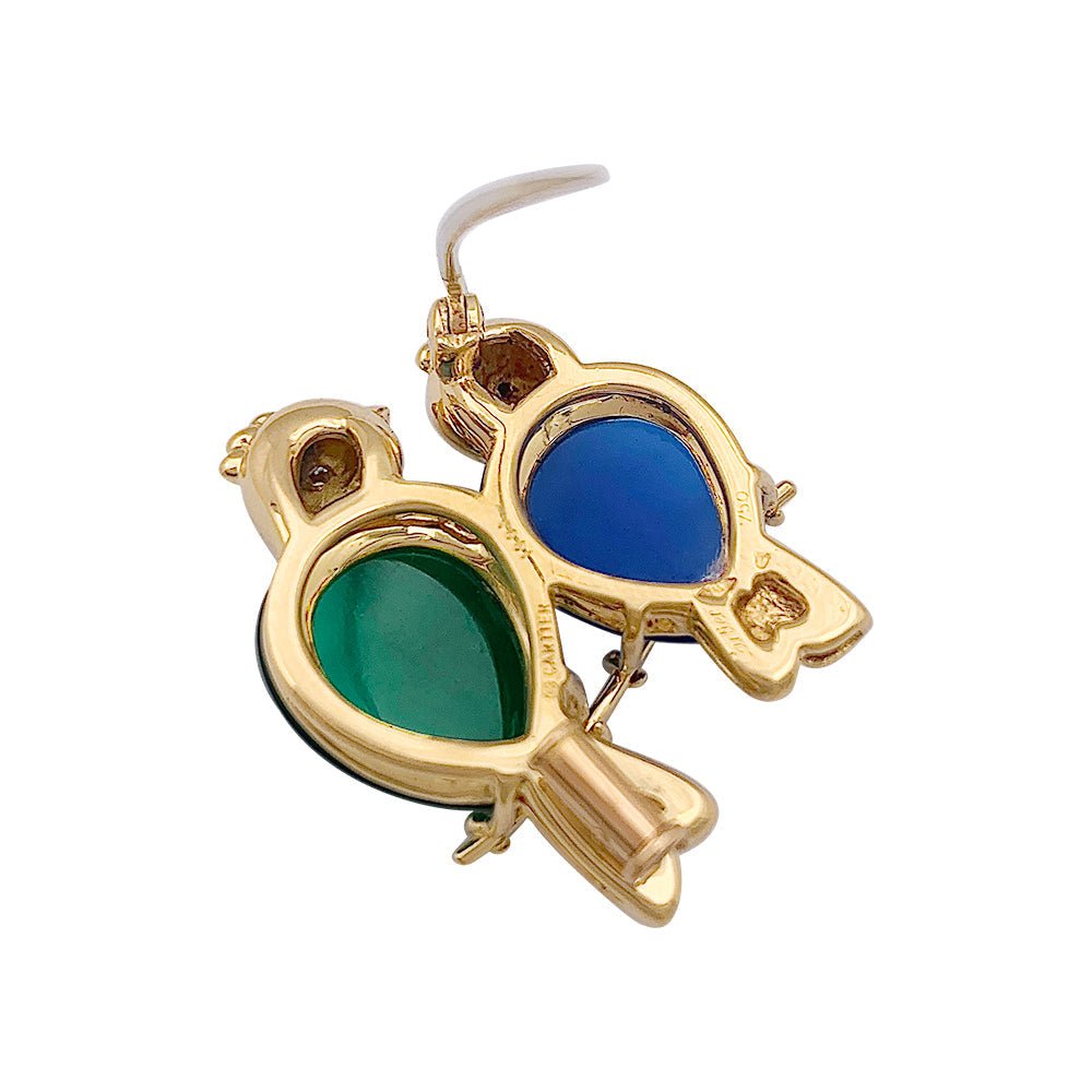 Broche Cartier "Inséparables" or jaune, diamants, pierres de couleur. - Maison Eloe