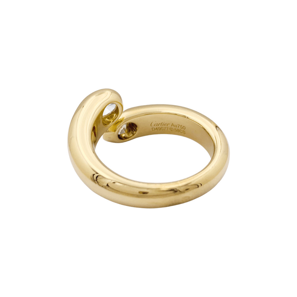 Bague Cartier, "Ellipse Deux Têtes Croisées", or jaune, diamants.