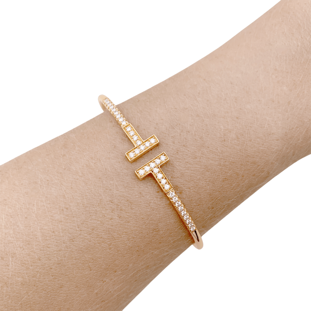 Bracelet Tiffany "Wire Tiffany T" en or rose et diamants.