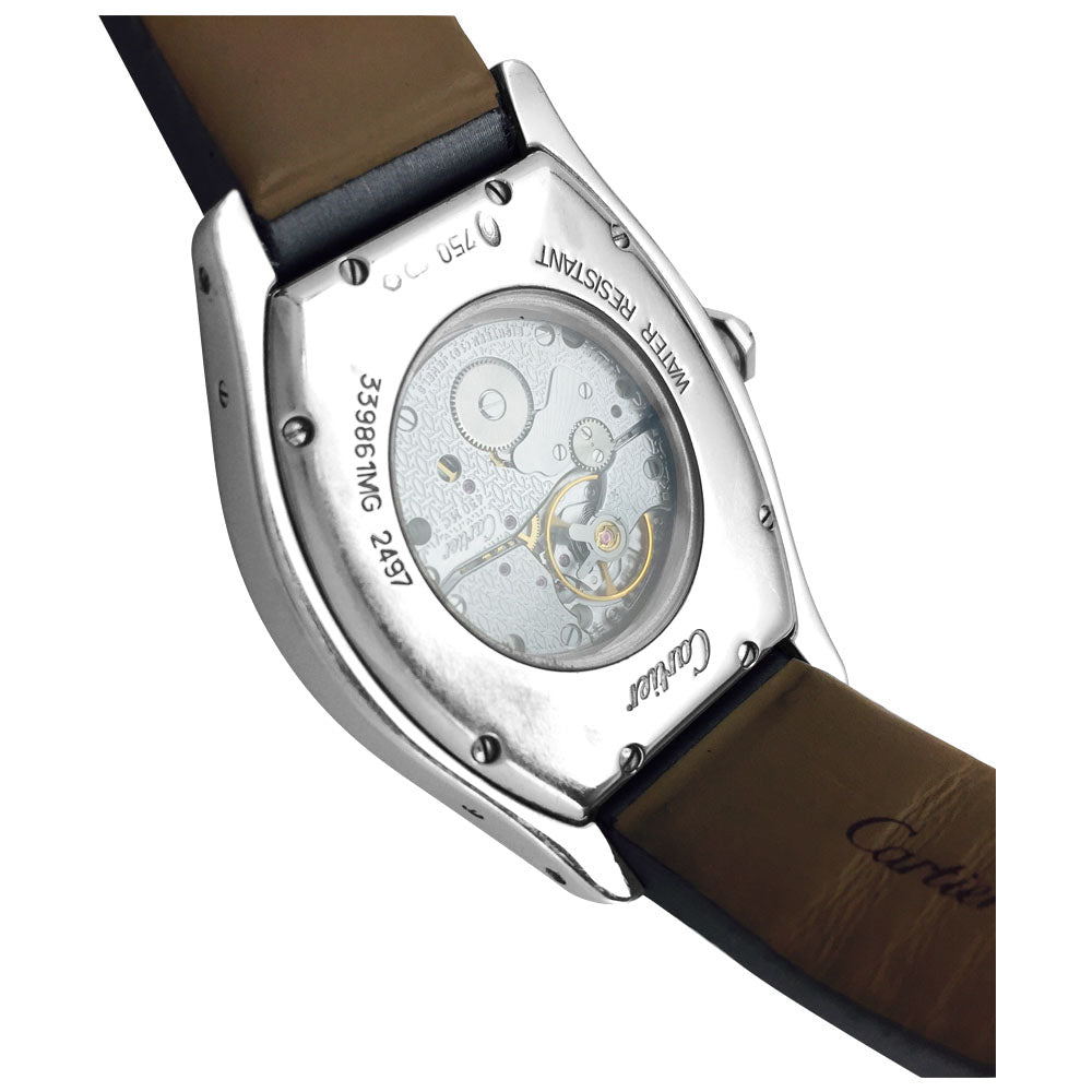 Montre Cartier modèle Tortue en or blanc et diamants sur satin - Maison Eloe