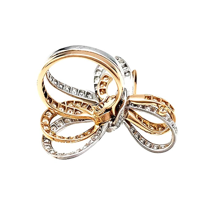 Van Cleef & Arpels ring, "Double Knot", white gold, pink gold, diamonds.