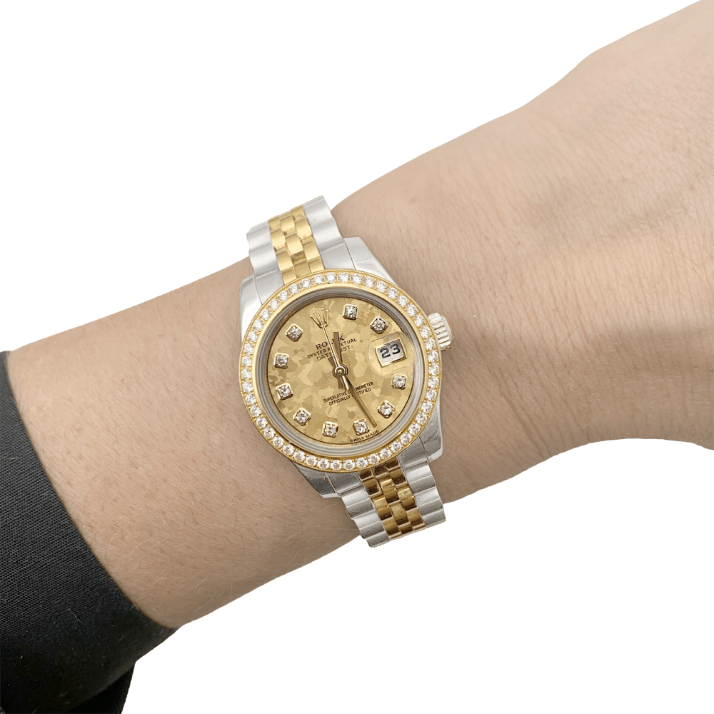 Montre Rolex, "Oyster Perpetual Lady-Datejust", or jaune, acier, diamants.