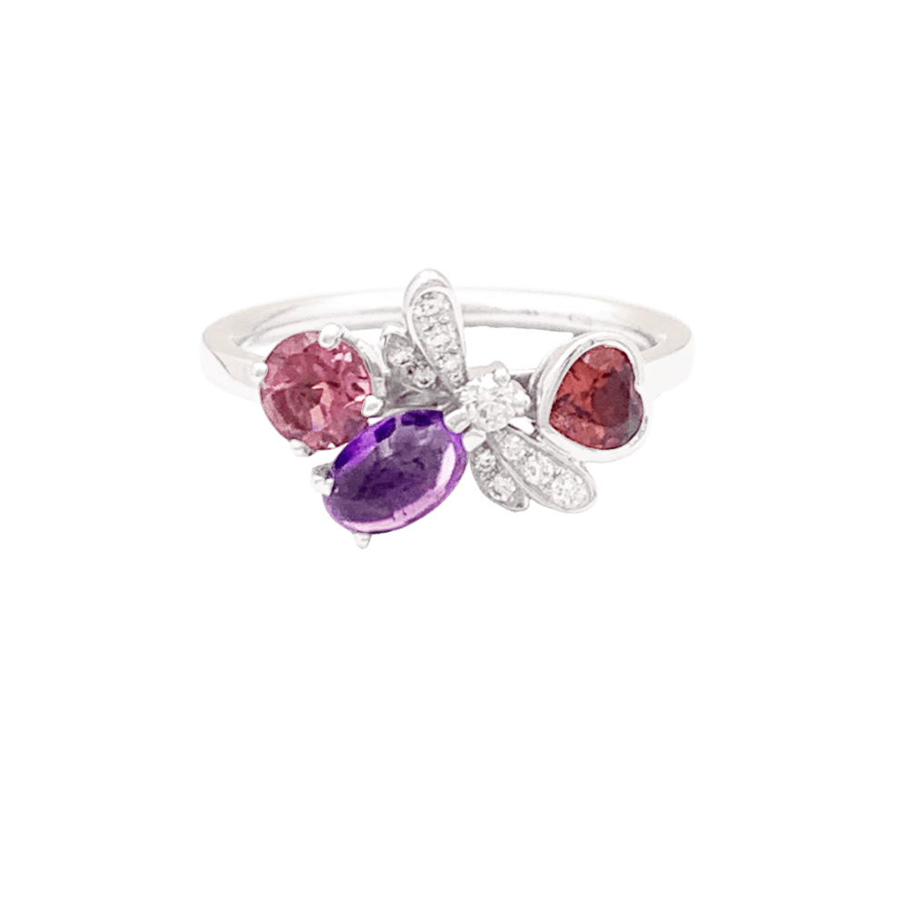 Bague Chaumet, "Attrape-moi...si tu m'aimes", or blanc, améthyste, grenat, diamants.