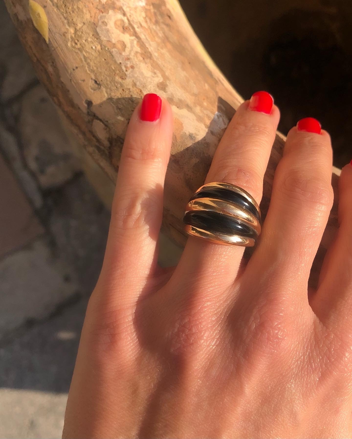 Rose gold and onyx bangle ring from Damiani