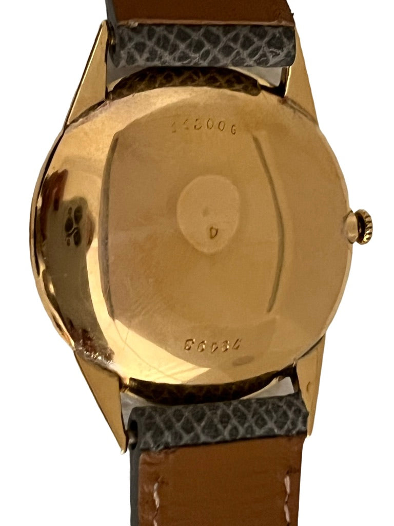 Van Cleef and Arpels, Gold watch on leather