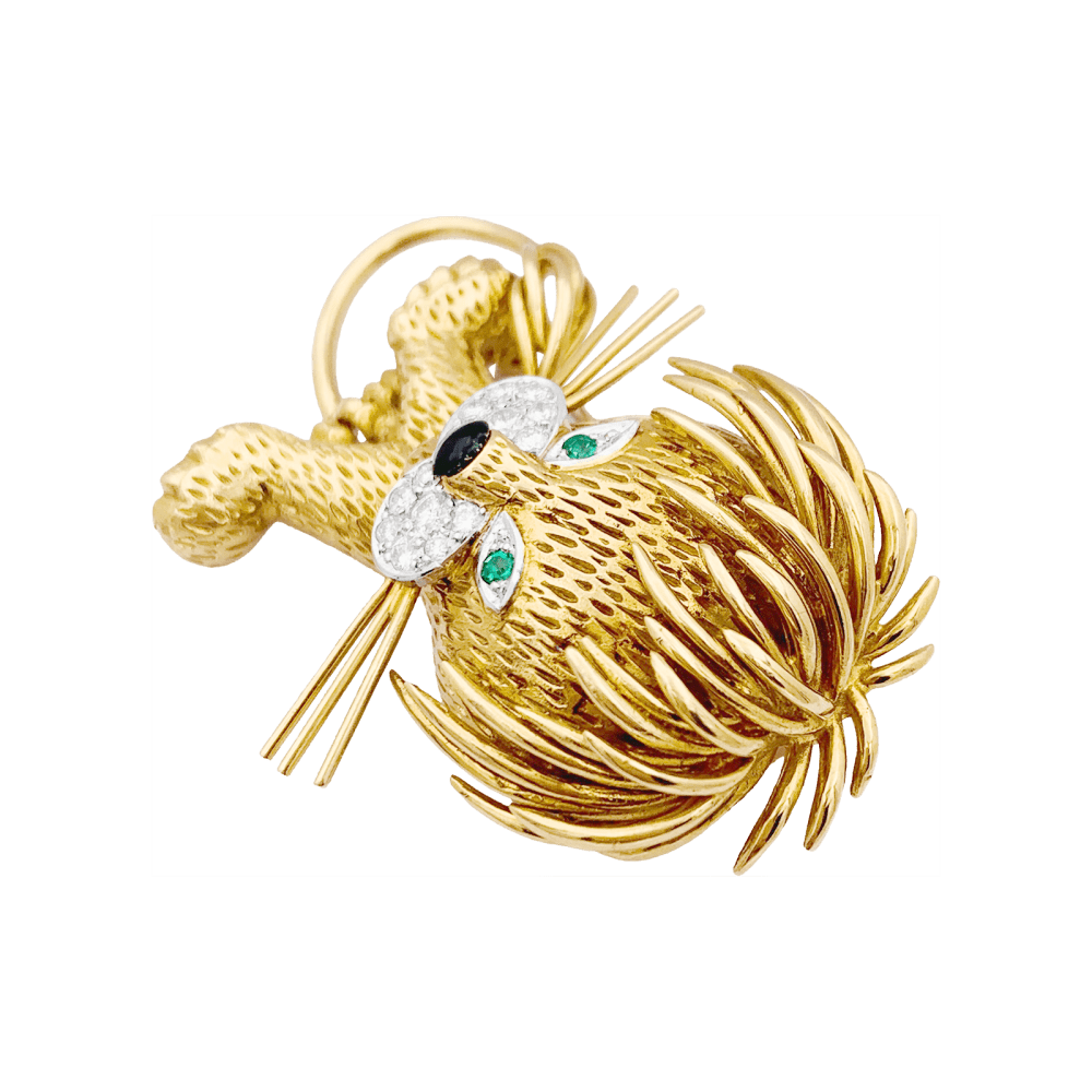 Clip Van Cleef & Arpels, "Lion Ebouriffé", or jaune, émeraude, diamants.