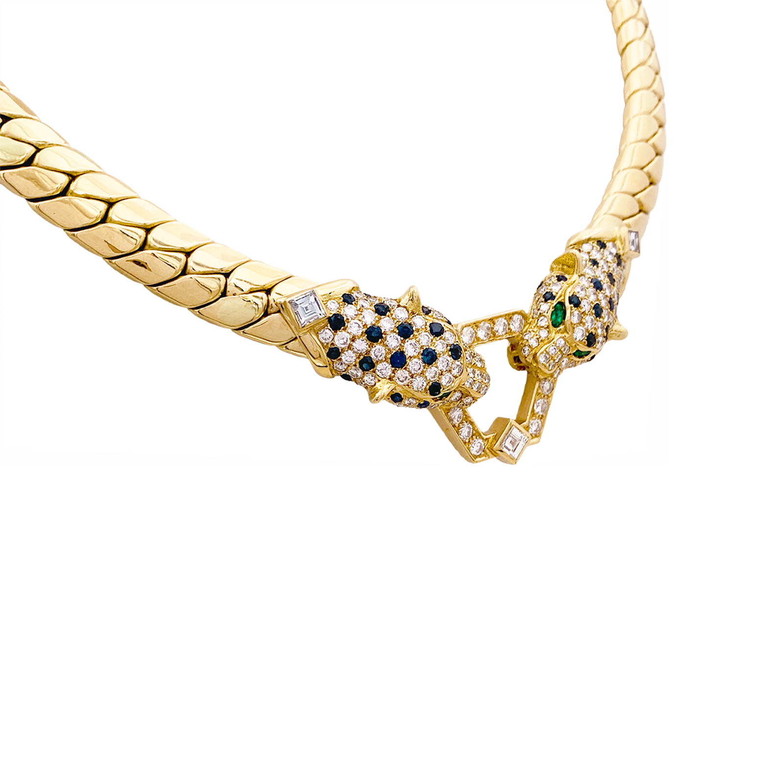 Collier O.J. PERRIN, or jaune, diamants, saphirs et émeraudes.