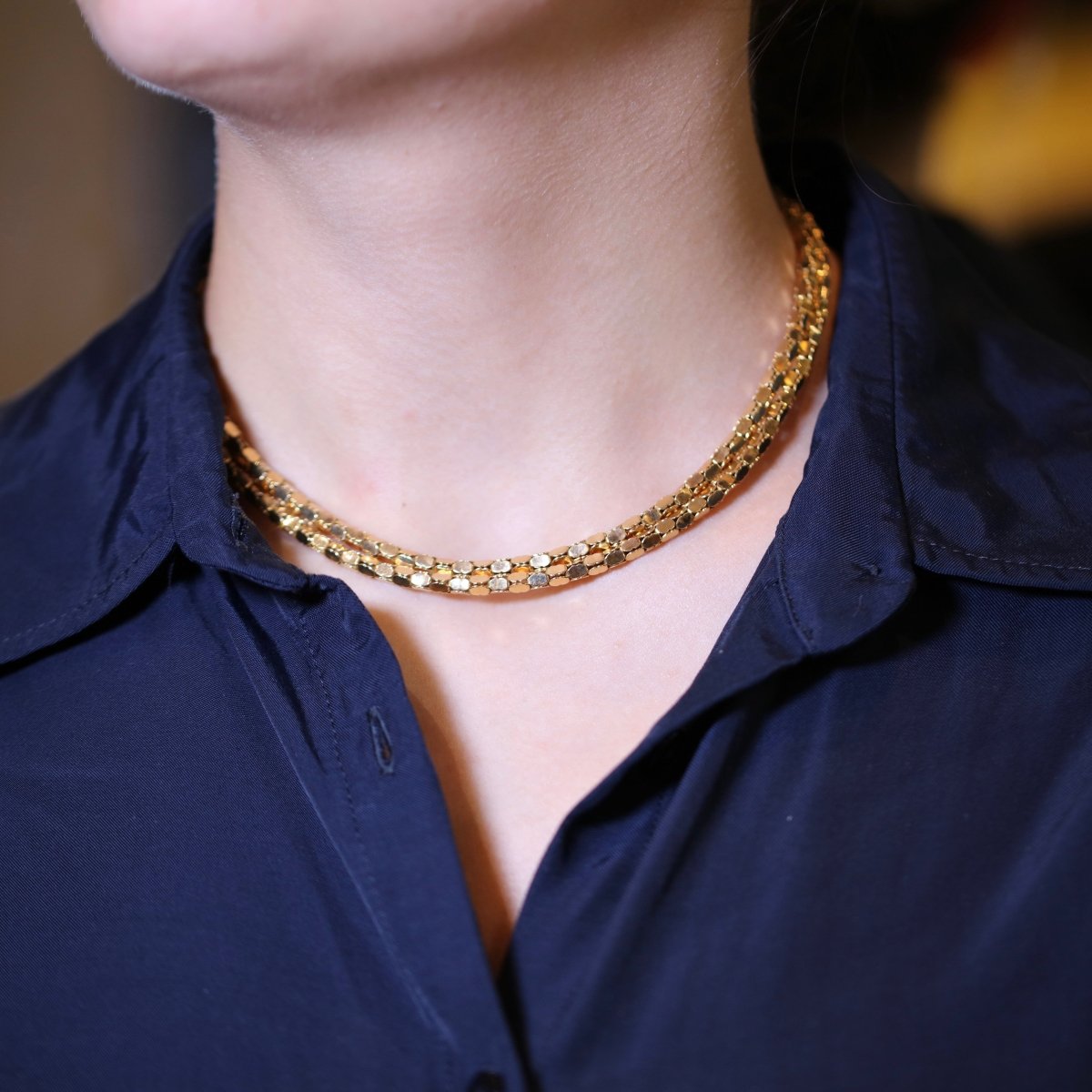 Collier en or jaune 18K à deux rangs, signé MELLERIO. - Maison Eloe