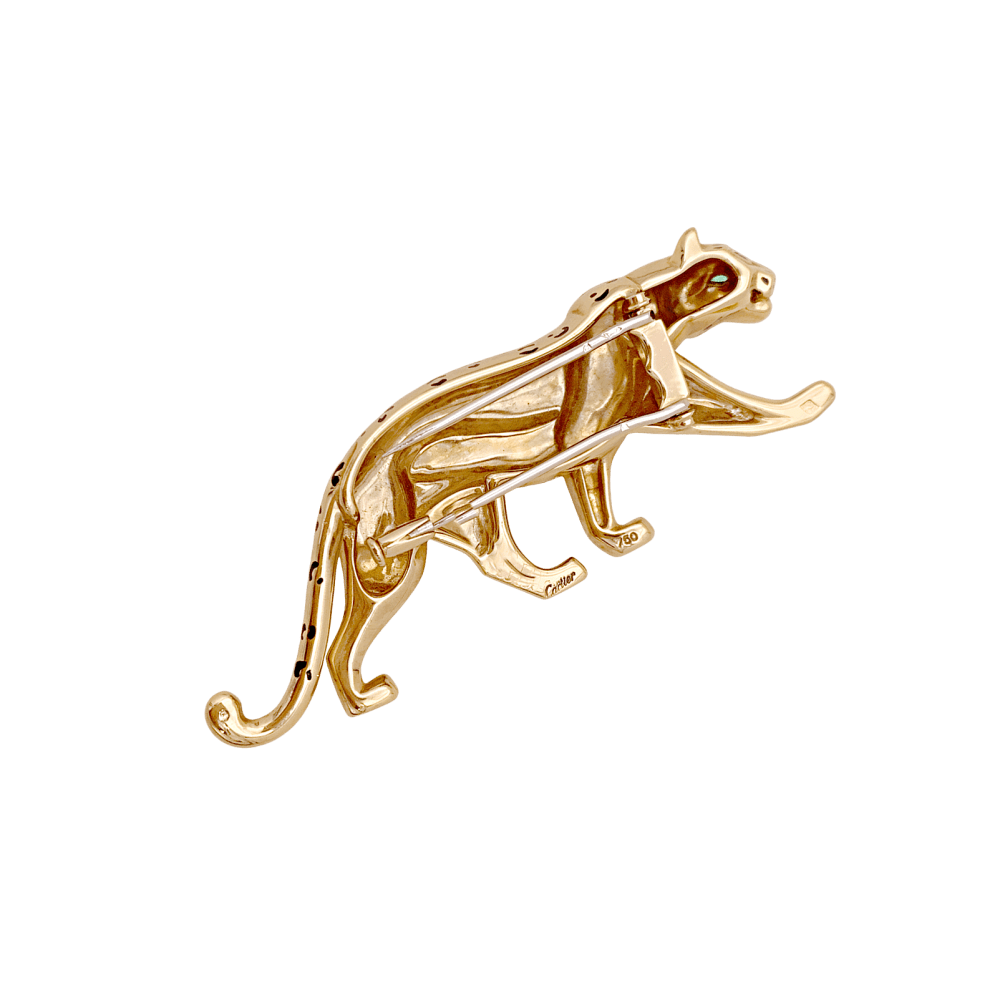 Broche Cartier, "Panthère", or jaune, émail, émeraudes.