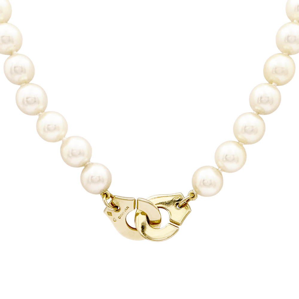 Collier de perles Dinh Van, "Menottes R12", en or jaune.