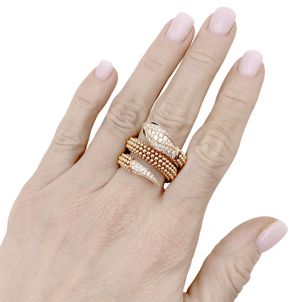 Bague Bulgari, "Serpenti" or rose, diamants et onyx. - Maison Eloe