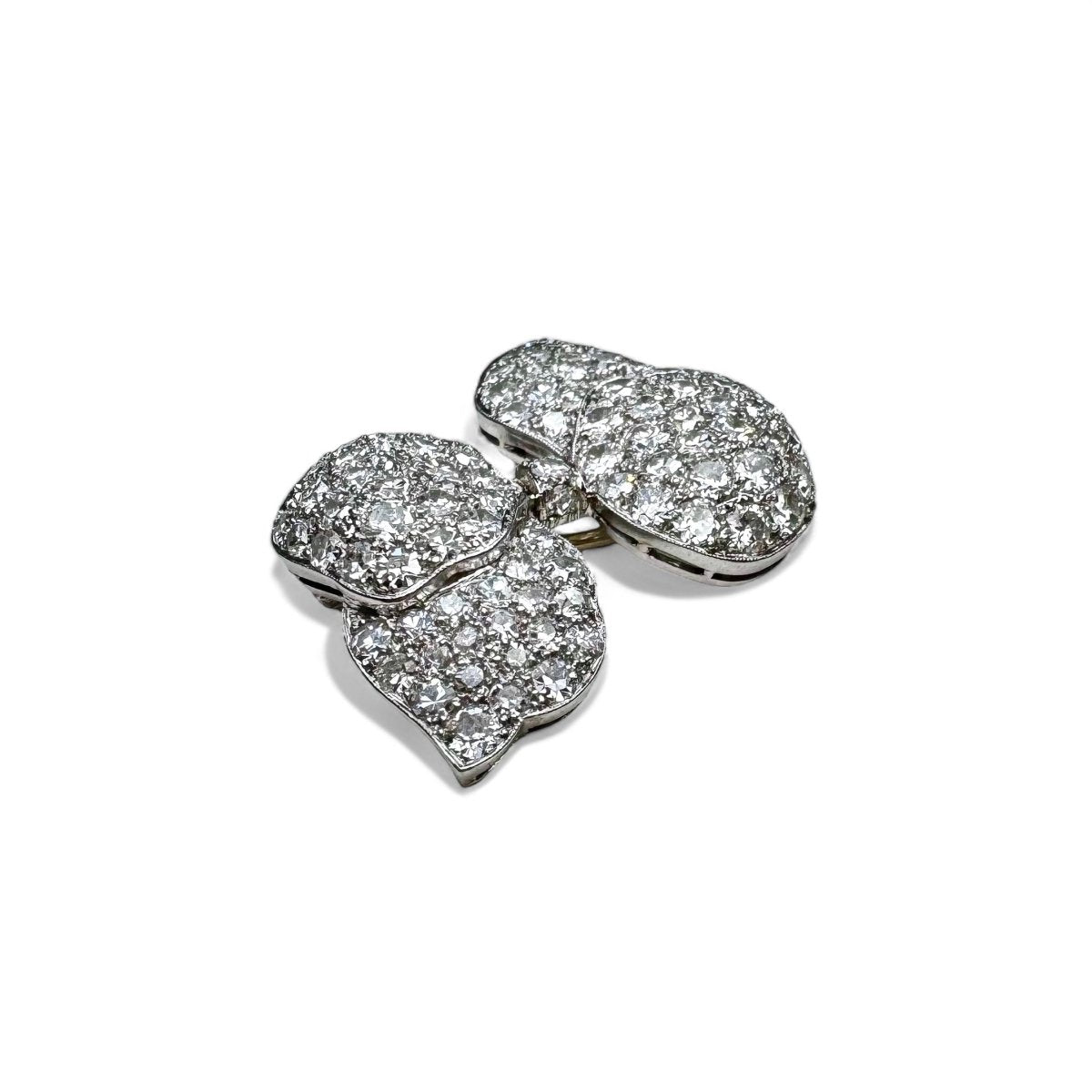 LACLOCHE FRÈRES Broche noeud en platine pavée de diamants. - Maison Eloe