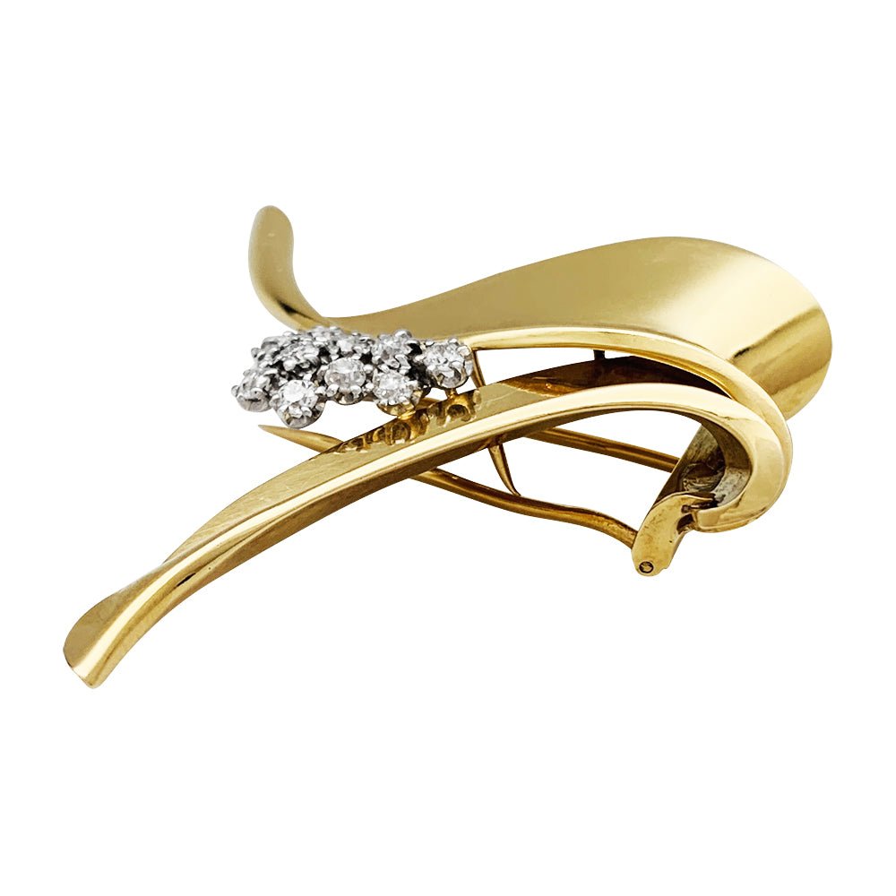 Broche Fontana en or jaune 750/000 et platine 950/000 sertie de 10 diamants taille ancienne. Poids brut : 11,4 grammes. - Maison Eloe