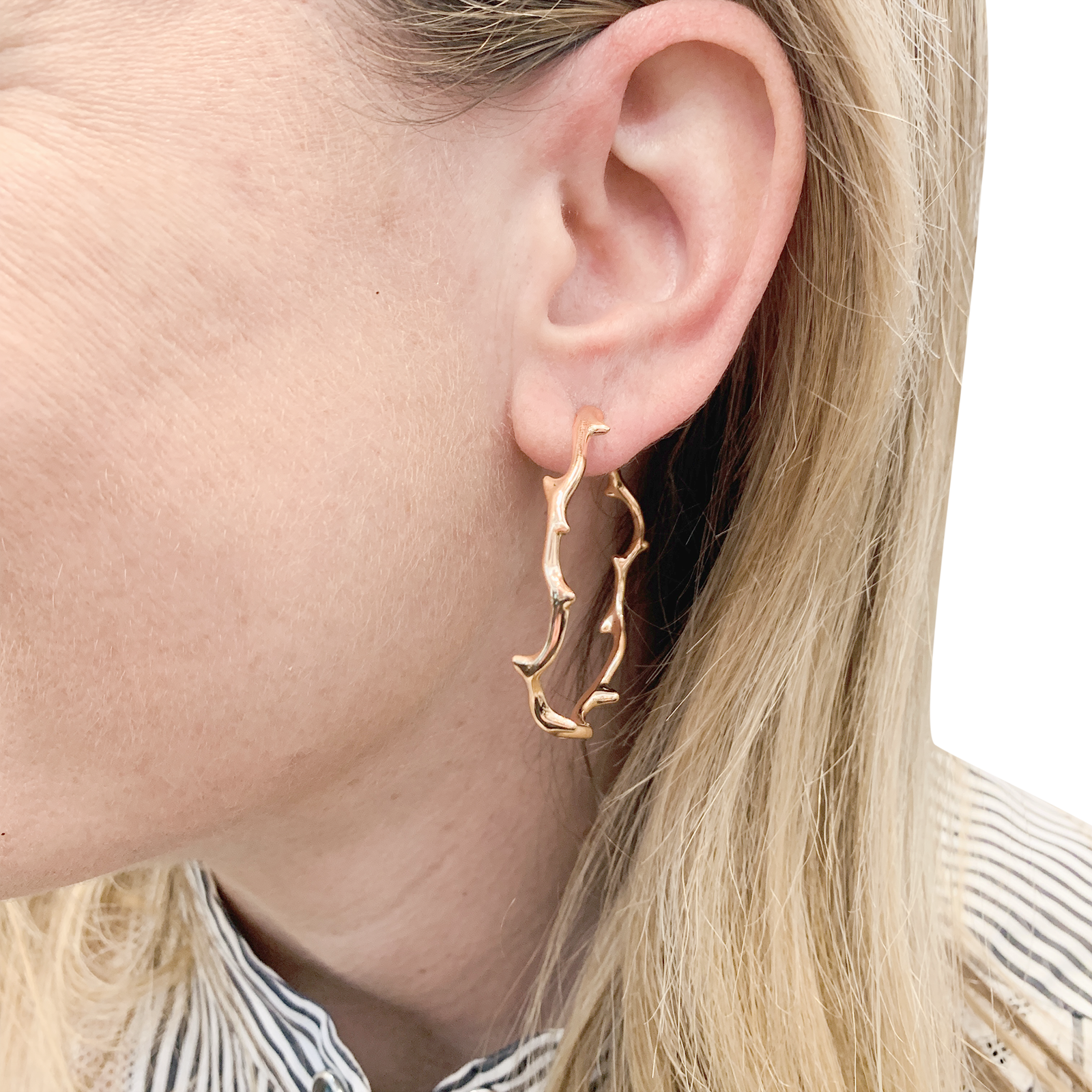 Boucles d'oreilles Dior, "Bois de Rose", or rose.