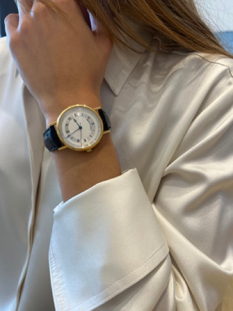 Breguet "Marine" watch in 18K yellow gold on leather strap