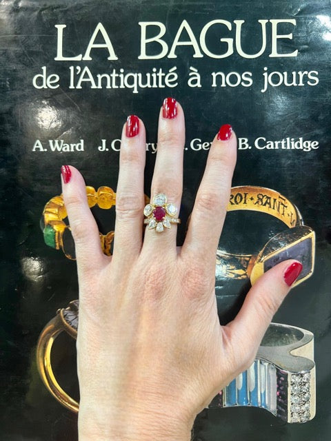 Yellow gold ring adorned with a natural Burmese Ruby and diamonds, signed MELLERIO