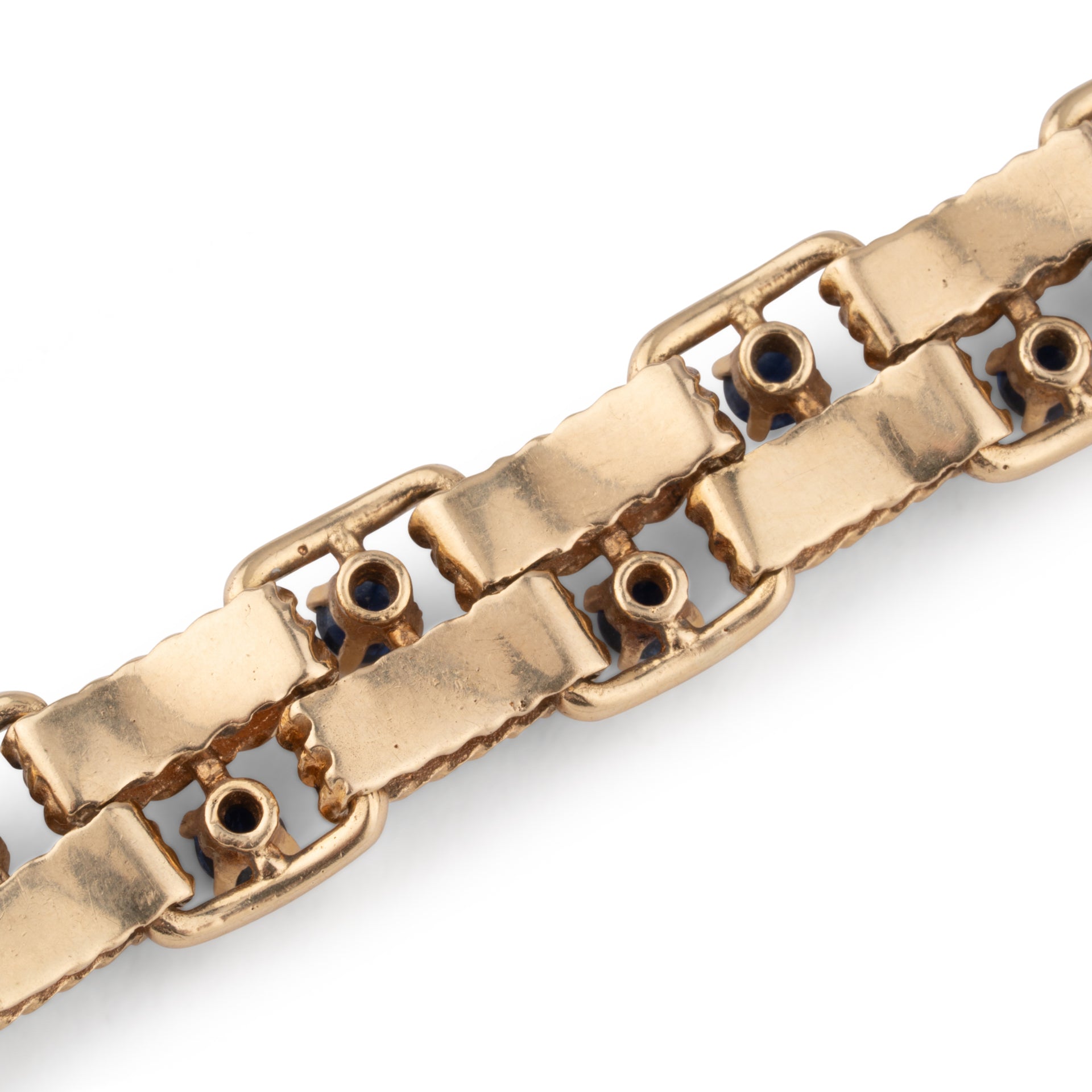 Boucheron, 18K chiseled yellow gold and sapphire bracelet