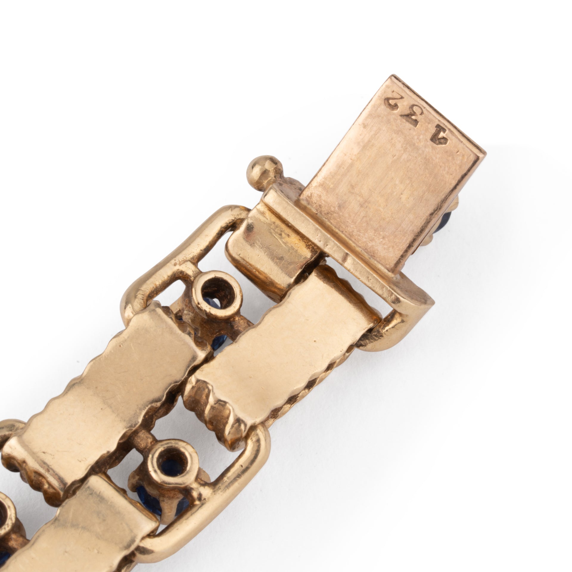 Boucheron, 18K chiseled yellow gold and sapphire bracelet