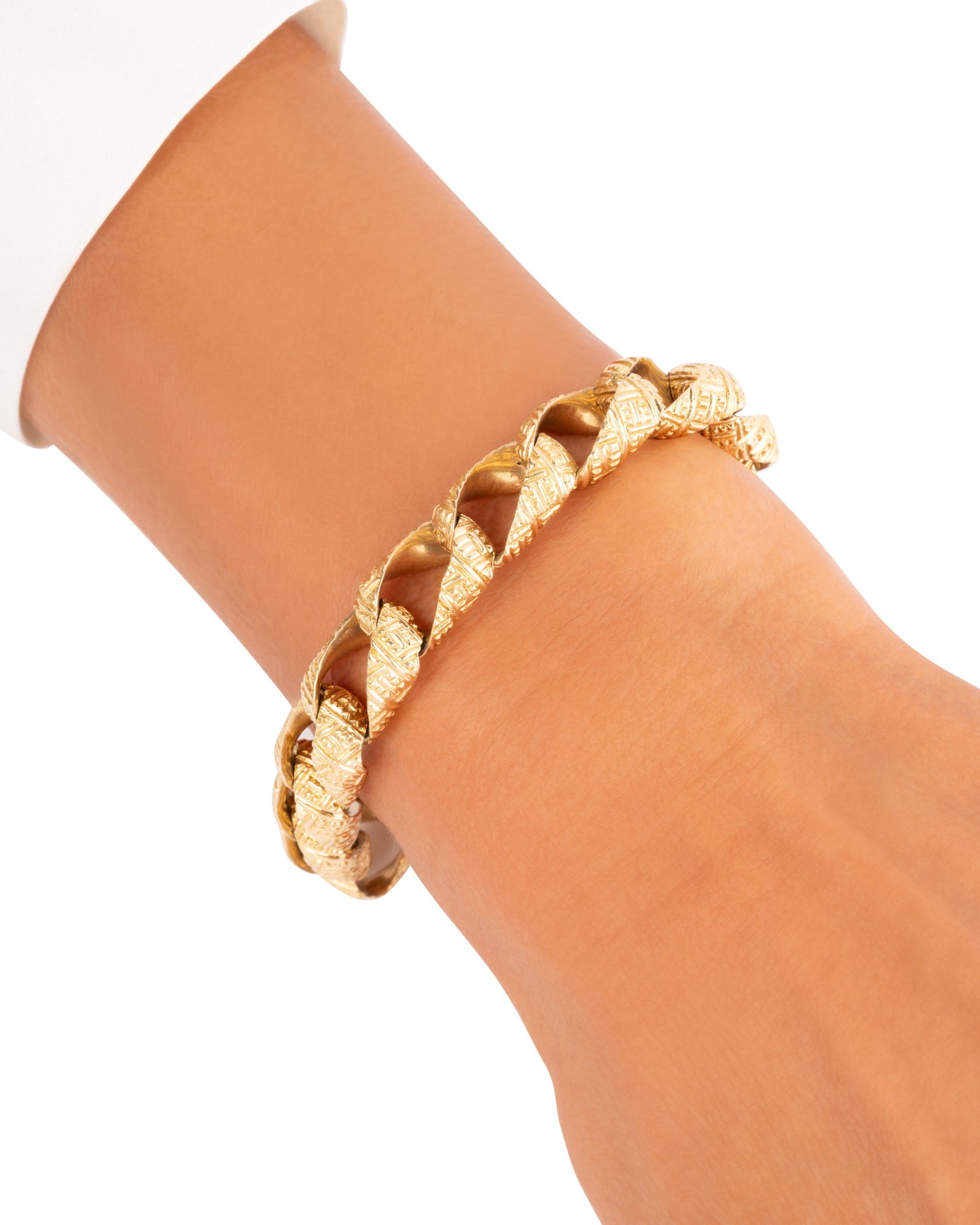 Bracelet Poinçon de Maître Rollang Fils & Cie en or 18K ciselé.