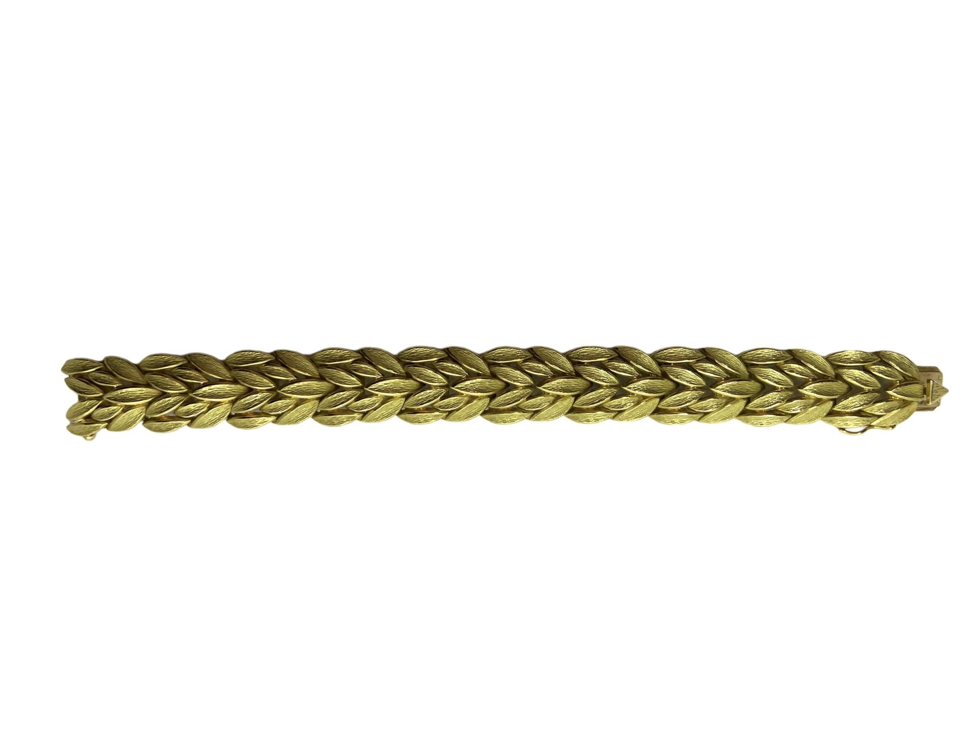 An 18K yellow gold leaf bracelet, French workshop hallmark