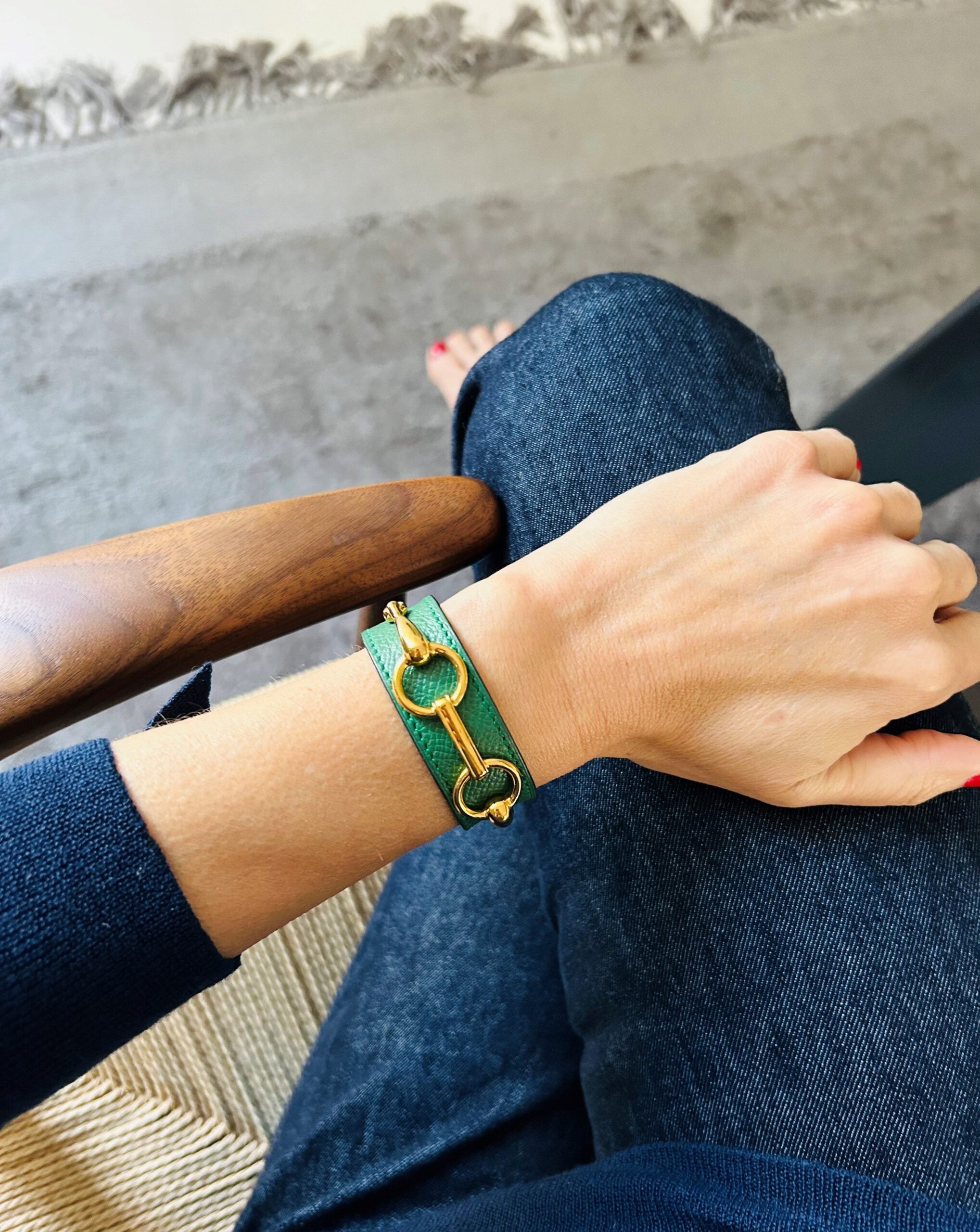 Bracelet from the house of Hermès in leather and gold metal