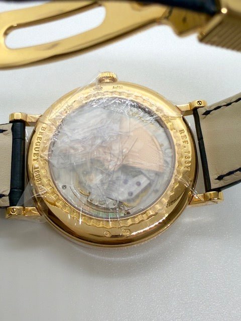 Breguet montre Breguet "Classique Moonphase" en or rose sur cuir noir full set - Maison Eloe