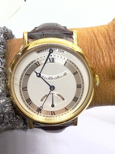 Breguet montre "Classique" seconde rétrograde, or jaune sur cuir marron - Maison Eloe