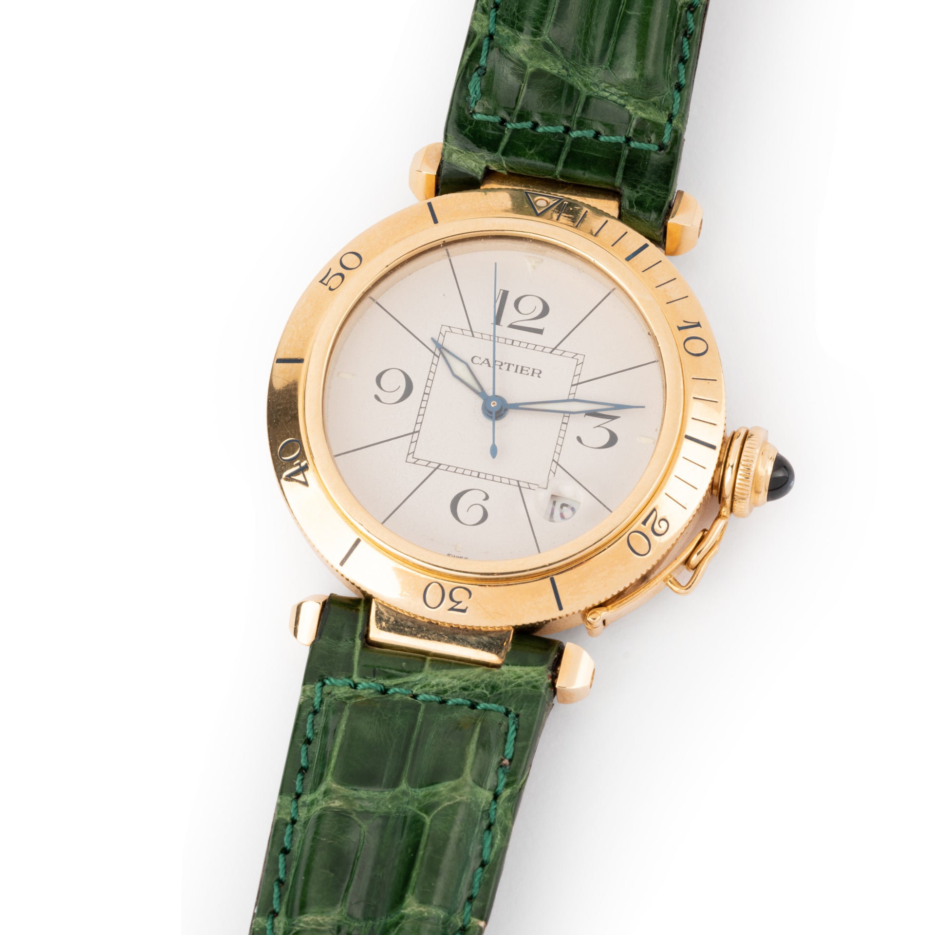 A Cartier "Pasha" watch in yellow gold on a leather strap