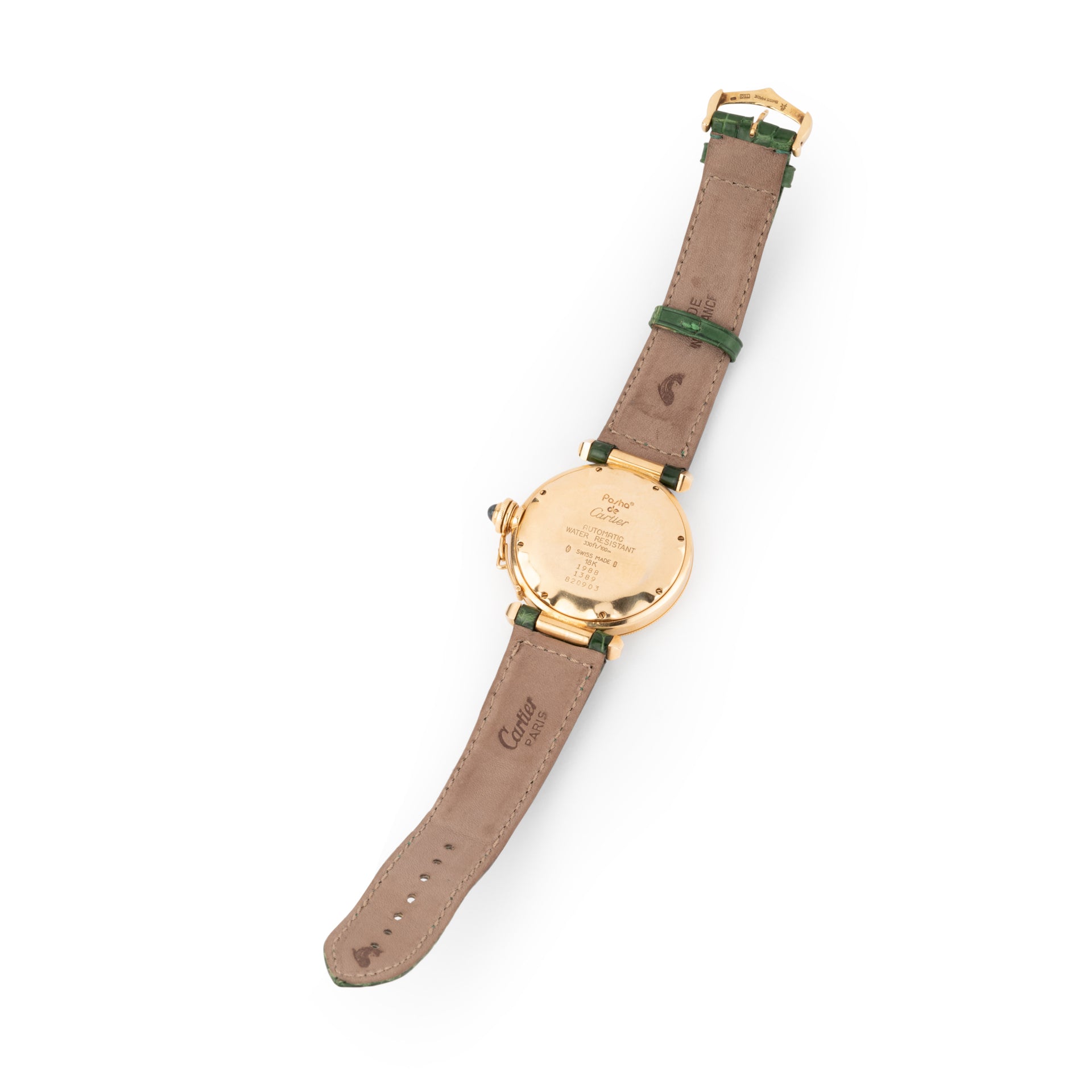 A Cartier "Pasha" watch in yellow gold on a leather strap