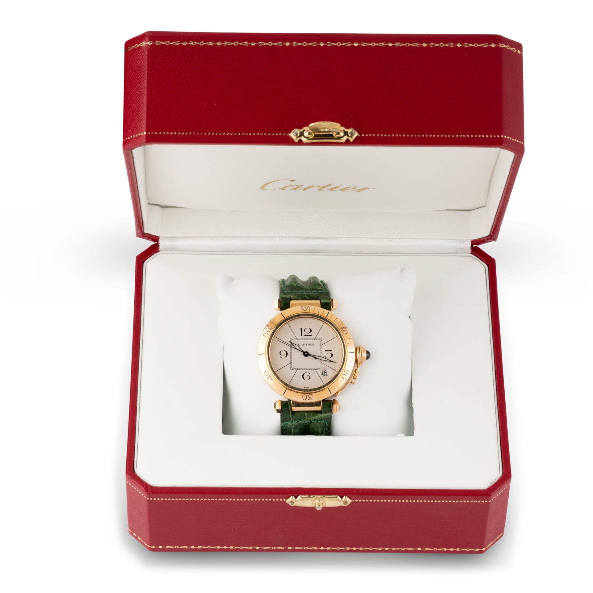A Cartier "Pasha" watch in yellow gold on a leather strap