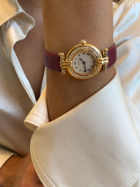 Montre Cartier "Colisée", or jaune et diamants