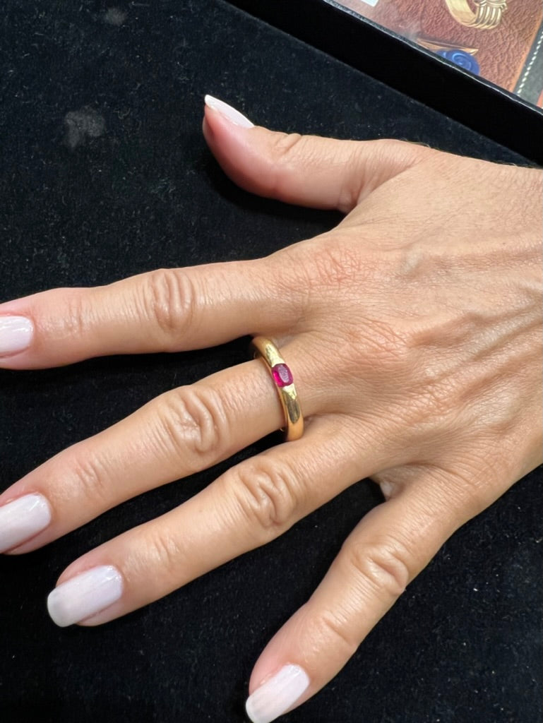 A Cartier yellow gold and ruby "Elipse" model ring