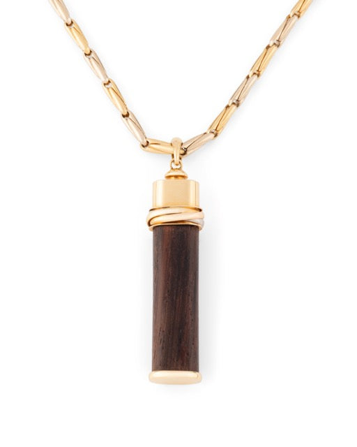 Cartier, collier deux ors 18K et pendentif "Touch Wood", en bois vintage