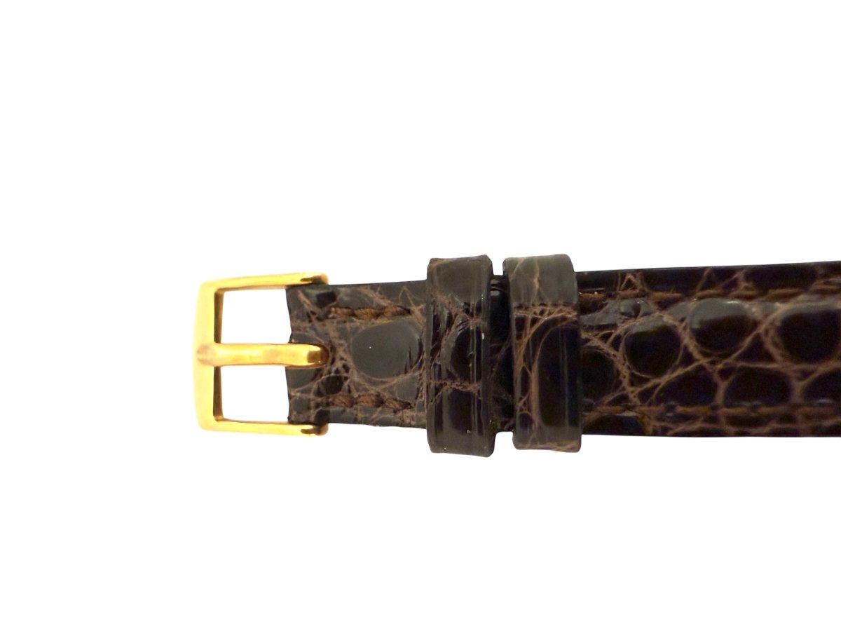 Cartier montre "Must Colisée", plaqué or sur bracelet crocodile marron - Maison Eloe