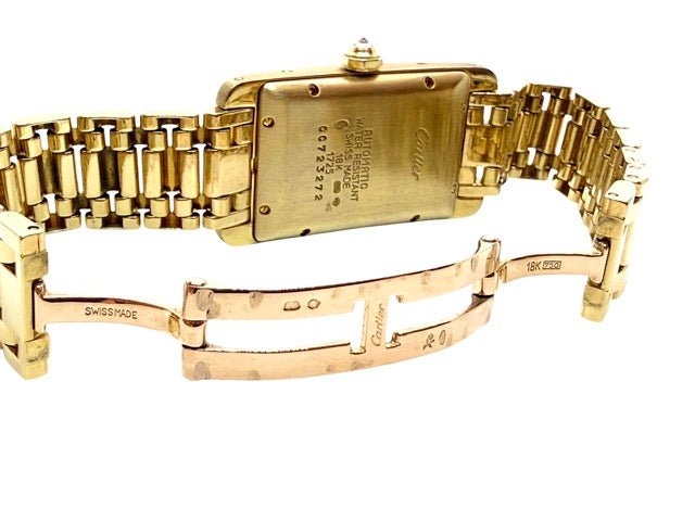 Cartier, montre Tank américaine en or jaune et diamants - Maison Eloe