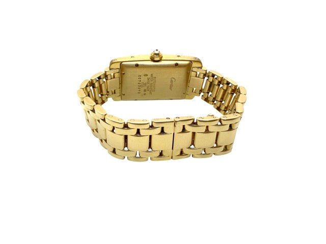 Cartier, montre Tank américaine en or jaune et diamants - Maison Eloe